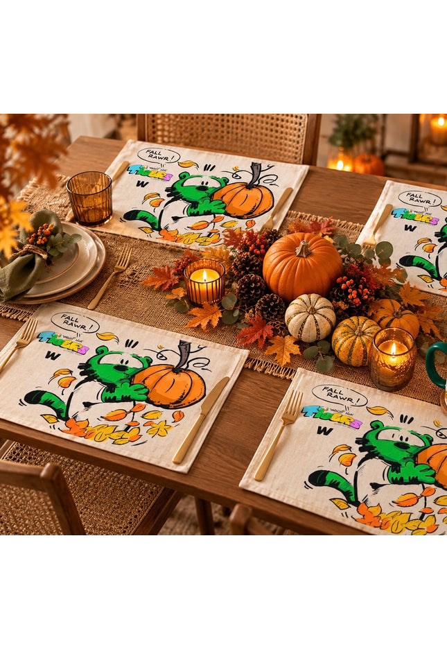 TIGERS FALL RAWR pumpkin placemat set featuring colorful comic art on a dining table with pumpkins and autumn decor.